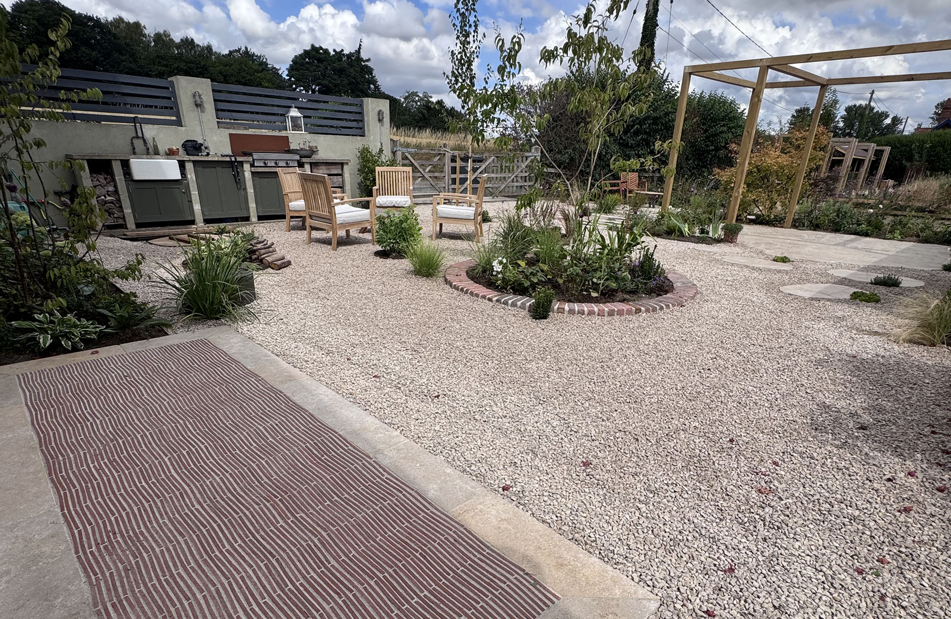 Willow tree landscapes contemporary courtyard with red linium bricks